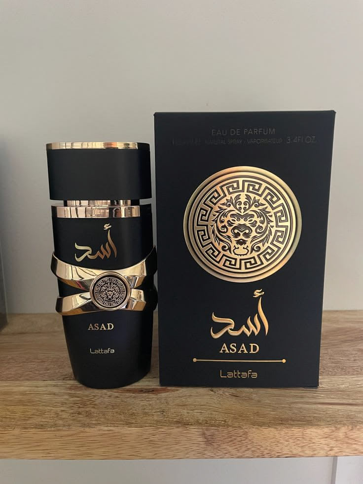Frasco preto de vidro de perfume masculino asad lattafa com detalhes dourados e design de cabeça de leão para uso oriental amadeirado
