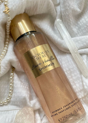Garrafa transparente elegante de bare vanilla shimmer victoria’s secret com tampa e rótulo dourados