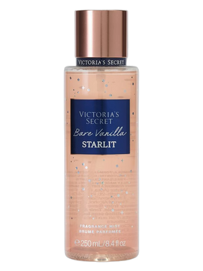 Frasco transparente de perfume corporal bare vanilla starlit victoria’s secret com tampa rose gold e líquido pêssego brilhante