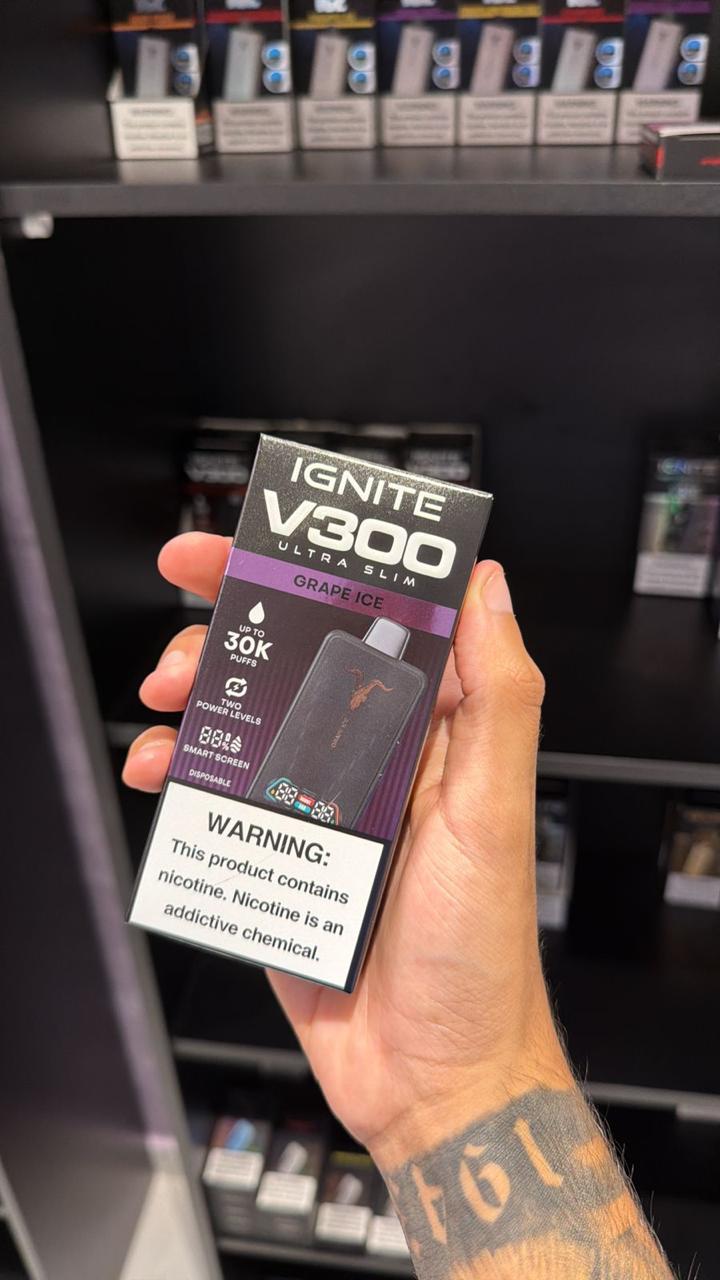 Ignite V300 Slim vape pen ultrafino preto e roxo em embalagem reta com design retangular elegante e acabamento degradê