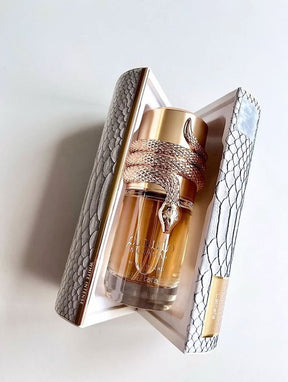 Frasco luxuoso dourado com design de cobra para perfume musamam white intense lattafa feminino 100 ml em caixa texturizada de couro de cobra