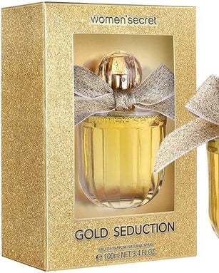 Perfume Gold Seduction Women Secret feminino com frasco dourado facetado, laço prata e tampa metálica em caixa glitter dourada