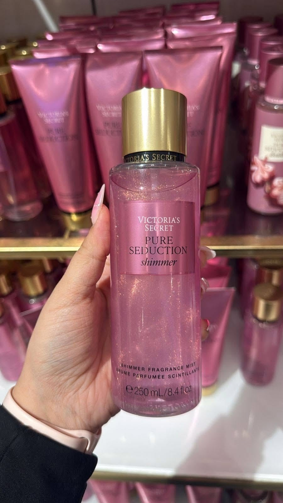 Fragrância em spray victoria’s secret pure seduction shimmer rosa com tampa dourada e líquido cintilante 250ml